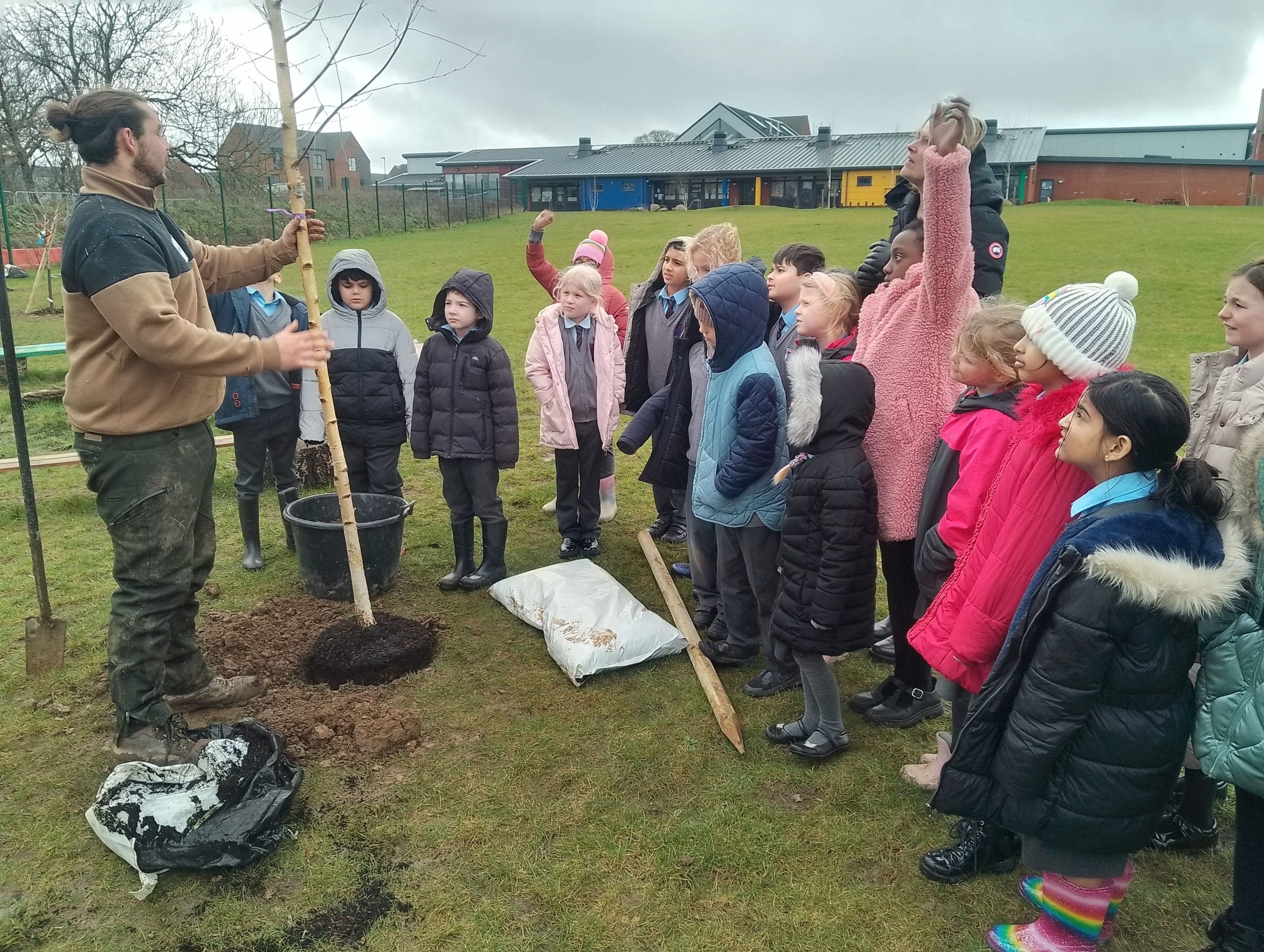 Forest School Students at Woodgate Primary Academy in Sussex get to plant their own 20 fruit and woodland trees.